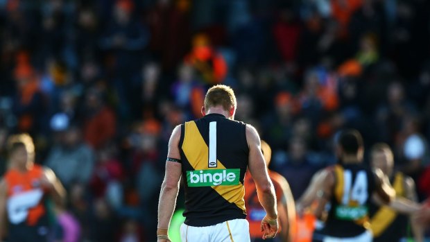 Richmond's Nick Vlastuin shows his dejection after the big loss to the Giants.