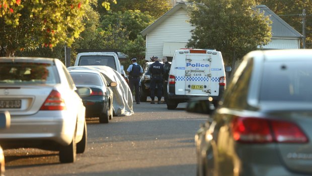 Police attend Mr Nguyen's home on Fitzroy Street in Campsie.