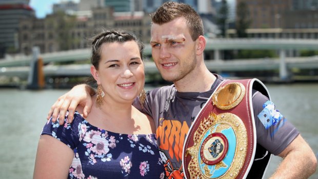 Next stop, Las Vegas: Jeff Horn is joined by wife Jo at a press conference after defending his WBO welterweight title belt.