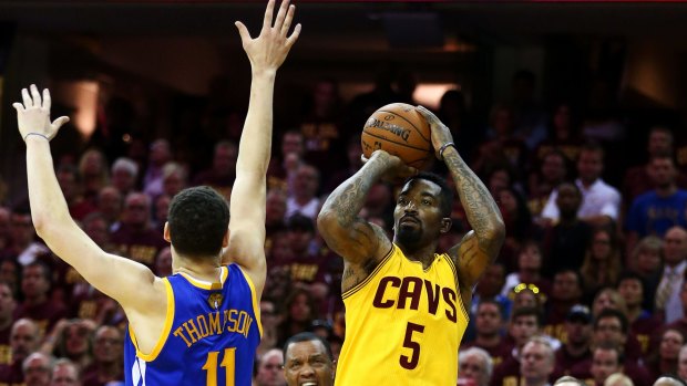 Staying: Cavaliers guard J.R. Smith shoots during Game Four of the NBA finals 