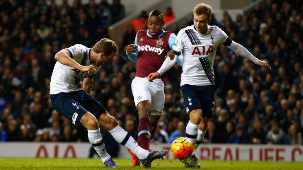 Harry Kane scores the opening goal for Spurs against the Hammers on Sunday.