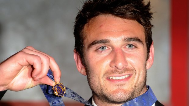 Banned Essendon player Jobe Watson with his 2012 Brownlow Medal.