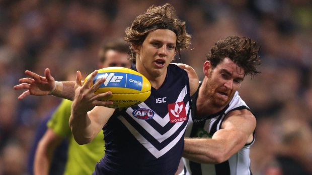 First to the ball: Nathan Fyfe of the Dockers.
