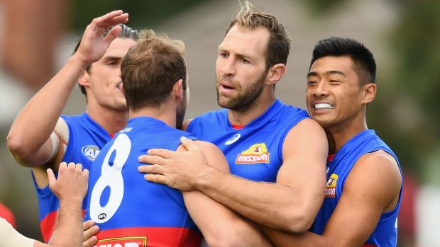 New year, new club: Travis Cloke with his new teammates.
