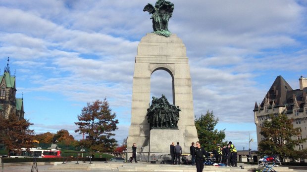 Police at the scene of a shooting at the National War Memorial in Ottawa, Canada.