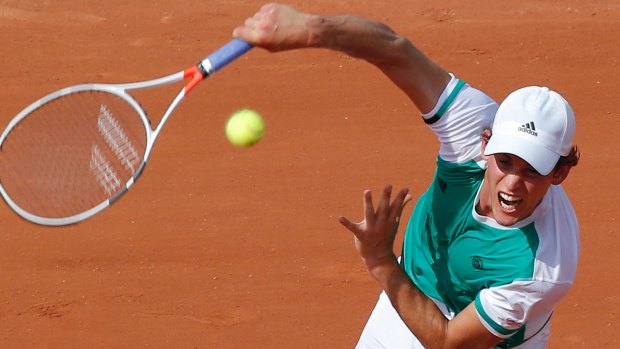 Austria's Dominic Thiem on his way to dumping Australia's Bernard Tomic out of the French Open on Sunday.