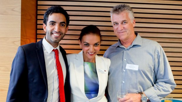Dr Anne Aly with her son Adam and "fangirling" husband Dave Allen.