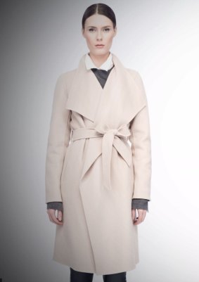 A coat by LINE the Label similar to that worn by Meghan Markle to announce her engagement to Prince Harry on Monday. 