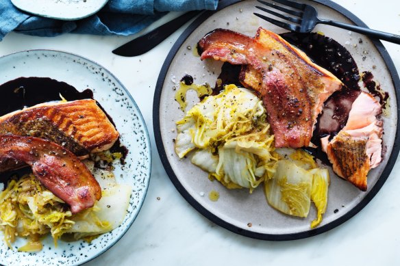 Roast salmon with red wine sauce and braised cabbage.  