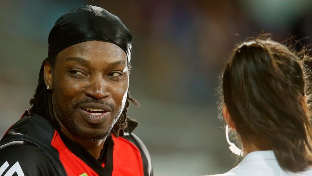 Chris Gayle of the Melbourne Renegades gives a TV interview to Mel McLaughlin. 