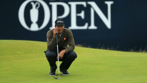 Adam Scott lines up a putt on the 18th green at the 145th Open Championship at Royal Troon, Scotland. 