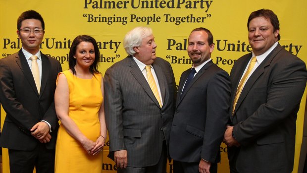 The Palmer United Party voting bloc in October 2013: Zhenya "Dio" Wang, Jacqui Lambie, Ricky Muir and Glenn Lazarus with party leader Clive Palmer.