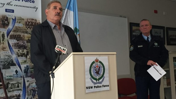 Arkan Kirnawi and Superintendent Peter Lennon, right, plead for information about Samer Kirnawi's unsolved death in Sydney's west in 2014.