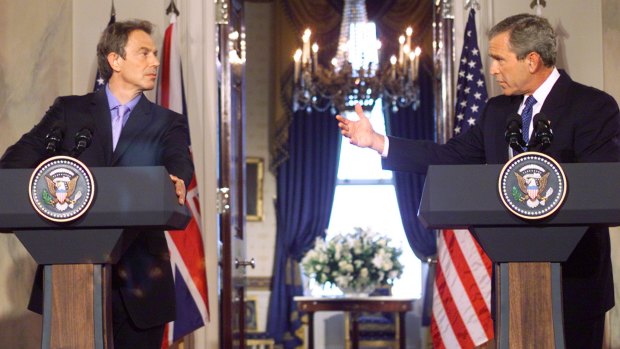 'These are bad people': George W. Bush (right) and Tony Blair address the media at the White House in July 2003.