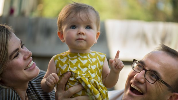 Federal Greens MP Adam Bandt with wife Claudia Perkins and daughter Wren, who is too young to be vaccinated against measles.