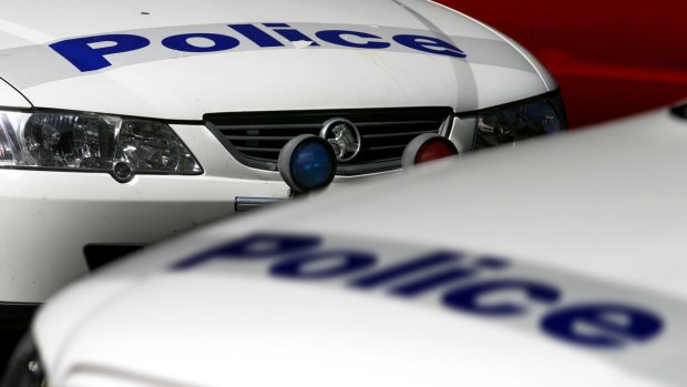 Police are investigating reports of a man in a red sedan approaching girls in the Mentone area. 