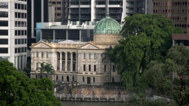 Critics say a building approved for Queen Street will ruin the heritage value of Customs House.