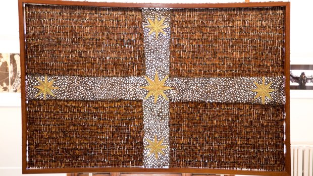 Donna Fortescue's  Beneath the Southern Cross We Stand, made with jarrah, red gum, gumnuts and sticks, xanthorrhoea resin and fronds, banksia leaves, hessian, braid, charcoal, rabbit skin glue, aluminium and
cotton thread.