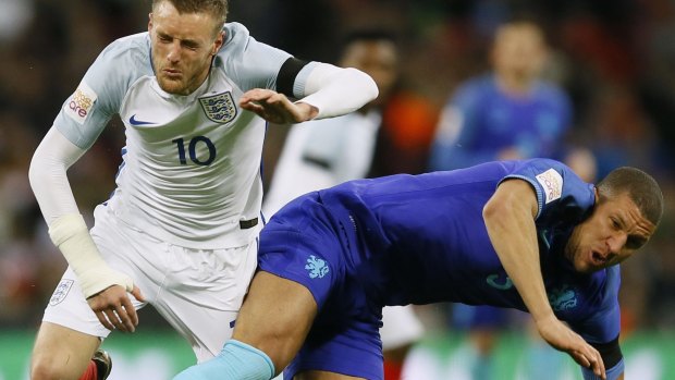 England's Jamie Vardy, left, is fouled by Netherlands' Jeffrey Bruma at Wembley.