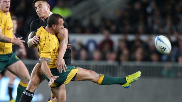 Unhappy memories: Quade Cooper is taken out by Sonny Bill Williams at Eden Park in 2012.