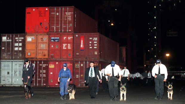1998: Security guards assembling themselves at Port Botany Patrick Terminal around midnight on April 7.