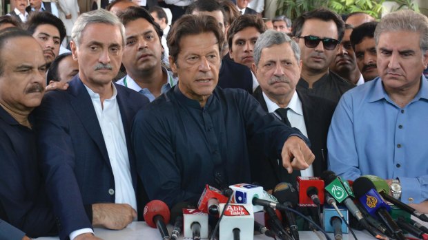 Pakistan opposition leader Imran Khan talks to journalists outside the Supreme Court in Islamabad last week.