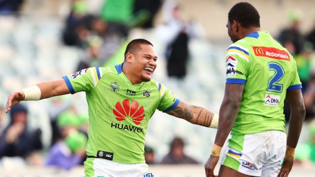 Joey Leilua celebrates with teammate Edrick Lee after scoring.