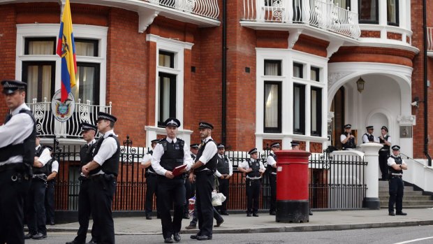 Police standing guard outside the Ecuadorian embassy in 2012.