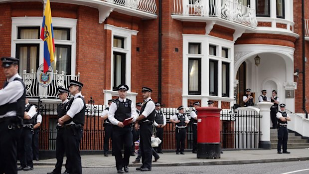 Police standing guard outside the Ecuadorian embassy in 2012.