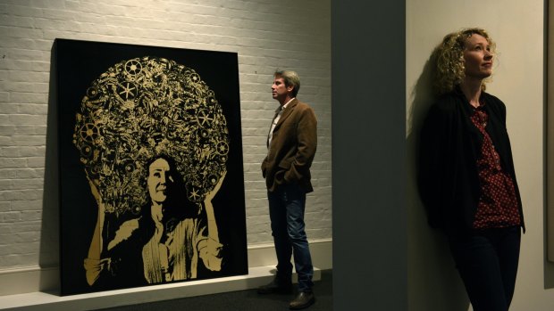 Artist James Powdtich with his entry in the Archibald portrait prize of Cath Keenan (pictured) which is now in the Salon des Refuses.
