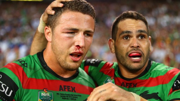 Sam Burgess and Greg Inglis during their 2014 NRL grand final win.