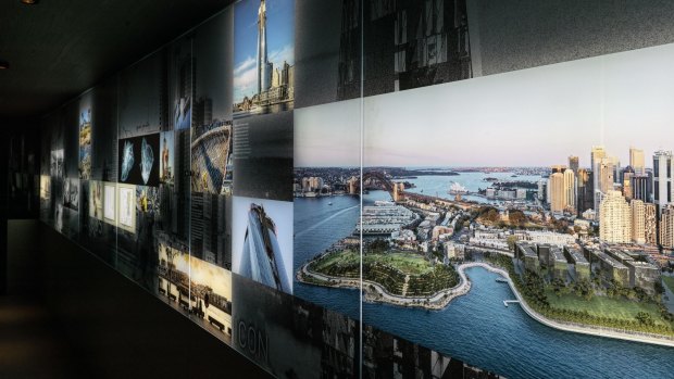 A compact holding space prior to reaching the deck is lined with lockers and scrawled with Barangaroo facts.