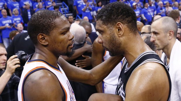 Final farewell? Oklahoma City Thunder forward Kevin Durant talks to San Antonio Spurs veteran Tim Duncan, who is likely to retire. 