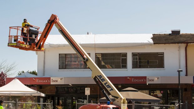 Mr Fluffy asbestos removal in progress at Ainslie Shops. 