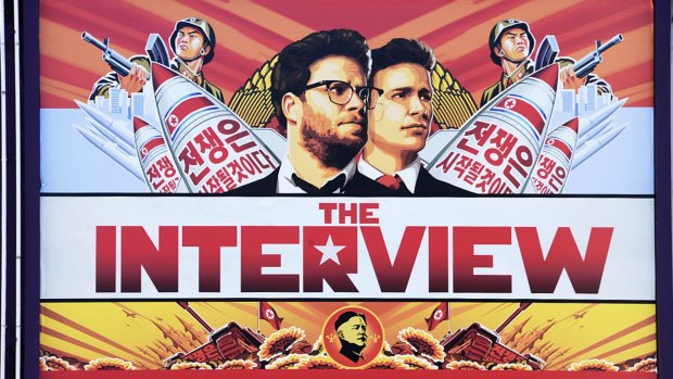 Finally released ... a poster promotes Sony film <i>The Interview</i> at a cinema in Los Angeles.