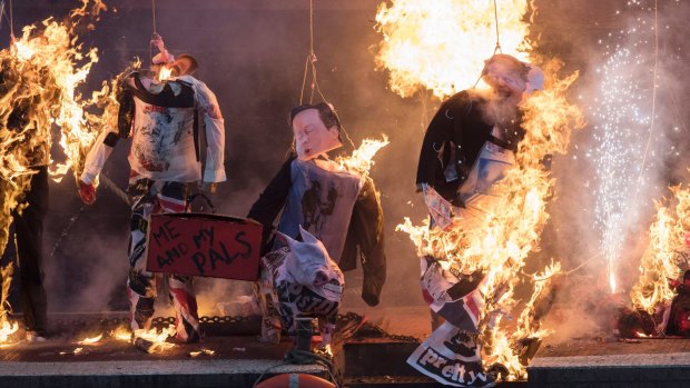 Effigies of British political figures were set ablaze as part of Saturday's protest.