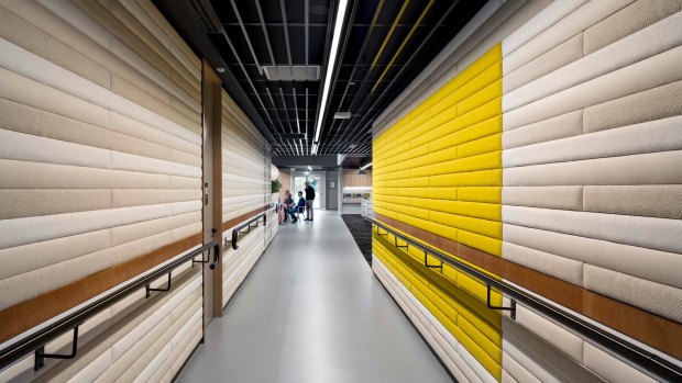The walls at Vision Australia headquarters are a mix of fabric and timber.
