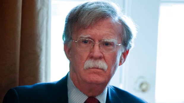 National Security Adviser John Bolton listens as US President Donald Trump speaks during a cabinet meeting at the White House in April.