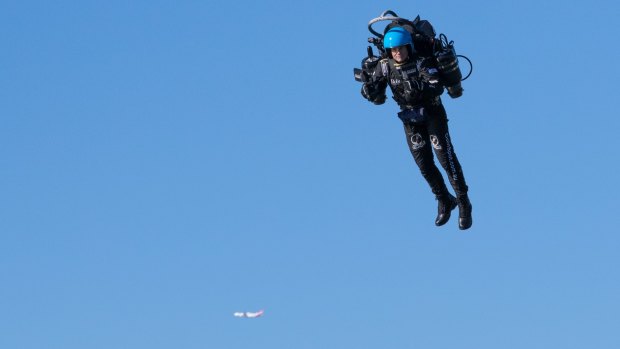 David Mayman, CEO of Jetpack Aviation demonstrates his jetpack in Sydney last year. Airline pilots in the US have reported seeing a man flying a jetpack near Los Angeles International Airport.