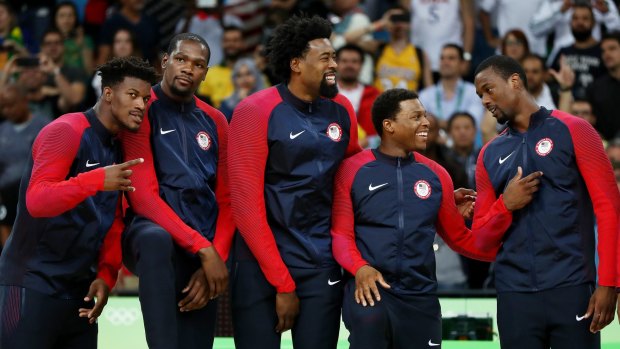 Winners are grinners: Jimmy Butler, Kevin Durant, DeAndre Jordan, Kyle Lowry, and Harrison Barnes wait for the medal ceremony.