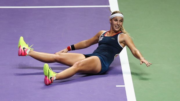 Dominika Cibulkova celebrates victory against Angelique Kerber in the WTA Finals in Singapore.