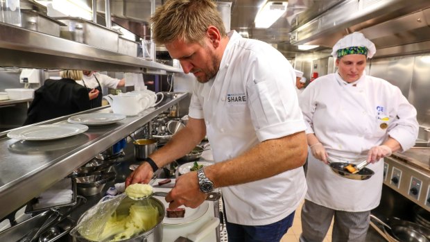 Chef Curtis Stone in action in the galley.