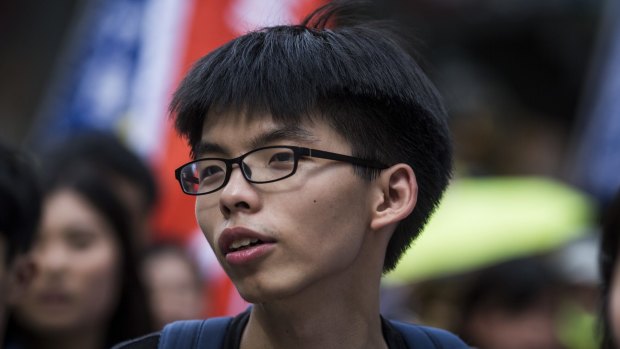 Joshua Wong, founder and convenor of the student group Scholarism, marches during a pro-democracy rally in Hong Kong on Sunday.
