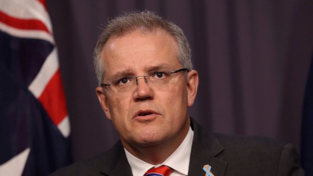 Last minute bid: Immigration Minister Scott Morrison details the concessions in a press conference on Wednesday.