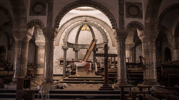 The ransacked sanctuary at St George's church in Qaraqosh, Iraq.