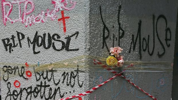 Graffiti at the site where homeless man Wayne 'Mouse' Perry was killed.