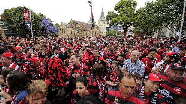 Wanderers supporters await the appearance of their AFC champions earlier this month.