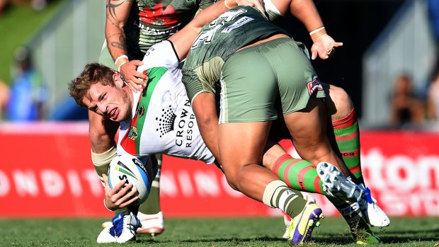 Commitment: George Burgess is dumped by Josh Papalii.