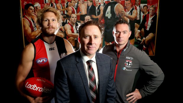 St Kilda lobbied for a pride game and have been given the go-ahead for a themed fixture against Sydney in round 21. Pictured are St Kilda footballer Sam Gilbert, CEO Matt Finnis and coach Alan Richardson.