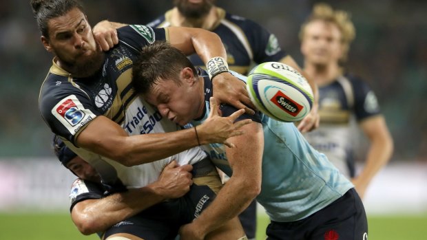 Big loss: Jack Dempsey, seen tackling Jordan Smiler of the Brumbies, has been sidelined with an ankle injury. 